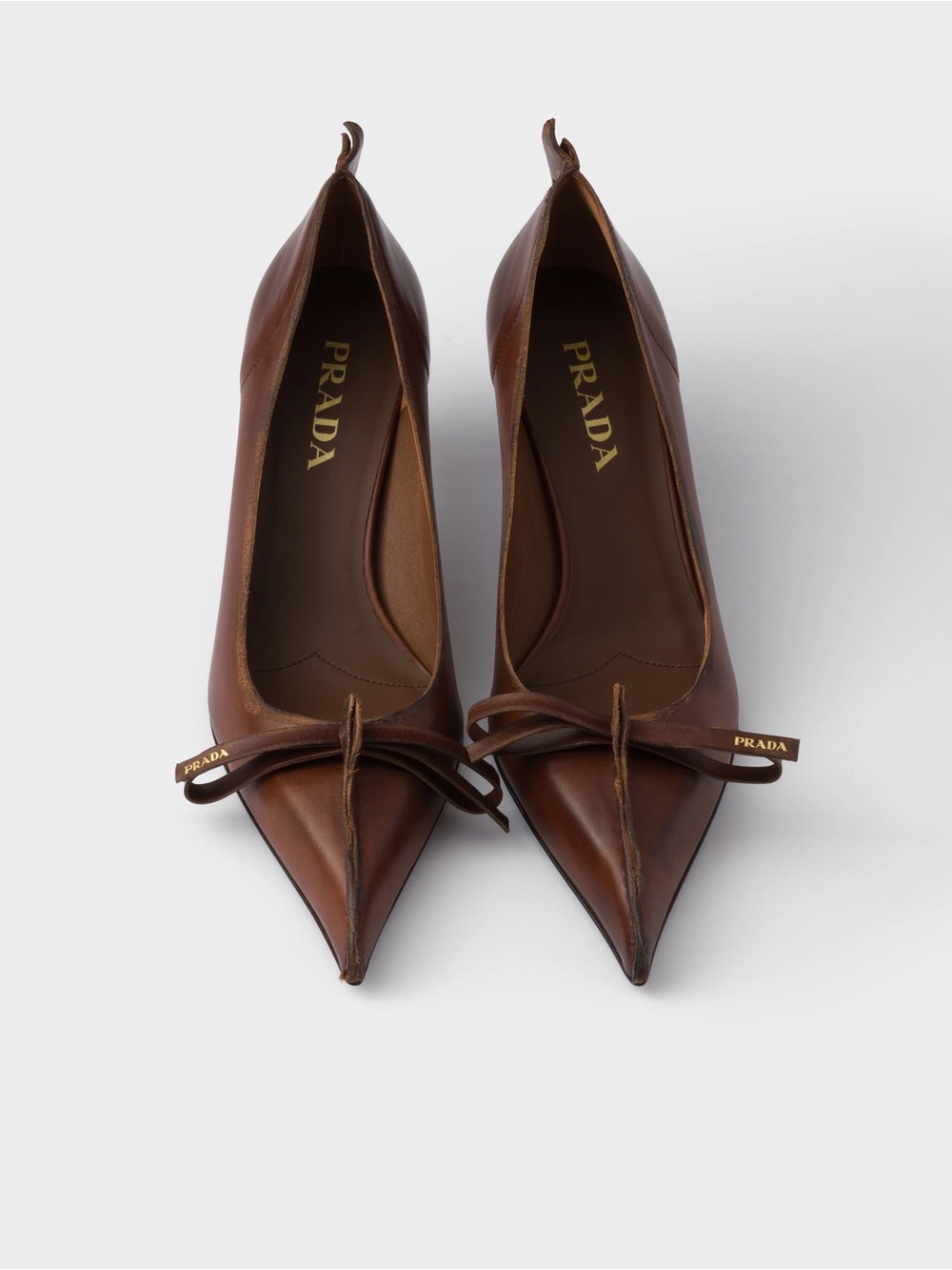 PRADA 85mm Antiqued Leather Pumps - Brown
$1,550